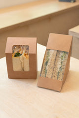 kraft sandwich wedge and wrap box with clear compostable pla windows