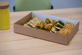 sandwich platter box without lid containing various sandwiches and wrap options